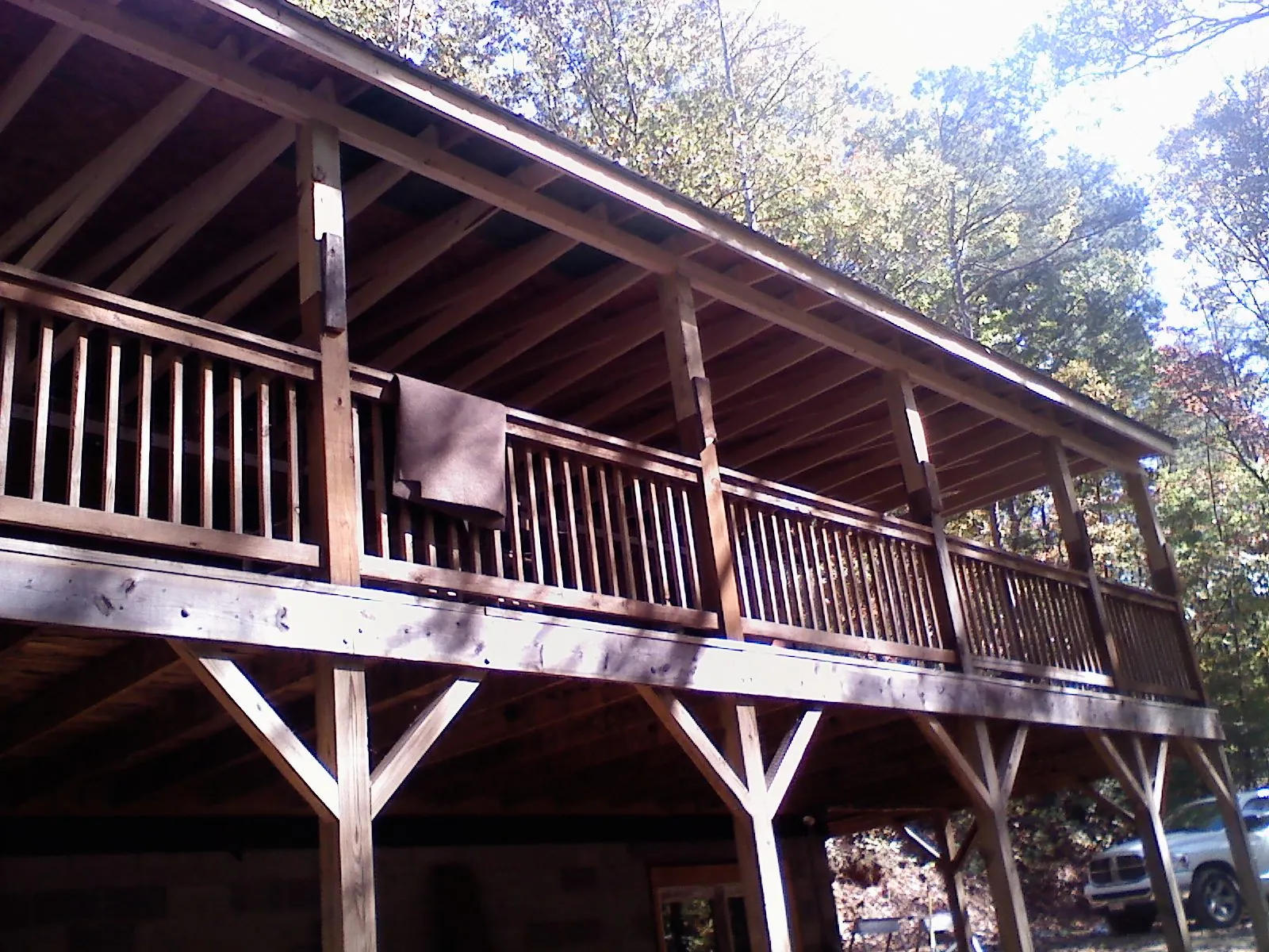 Timber framing under a new elevated porch and deck — Roof Leak Repair in Westover by Roofing Brothers